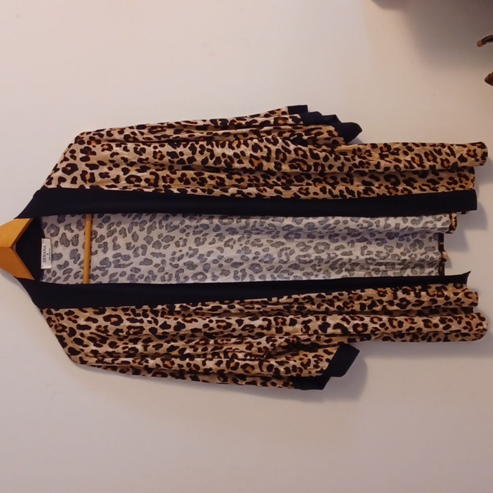 New without tag very cute and comfy animal print cardigan.